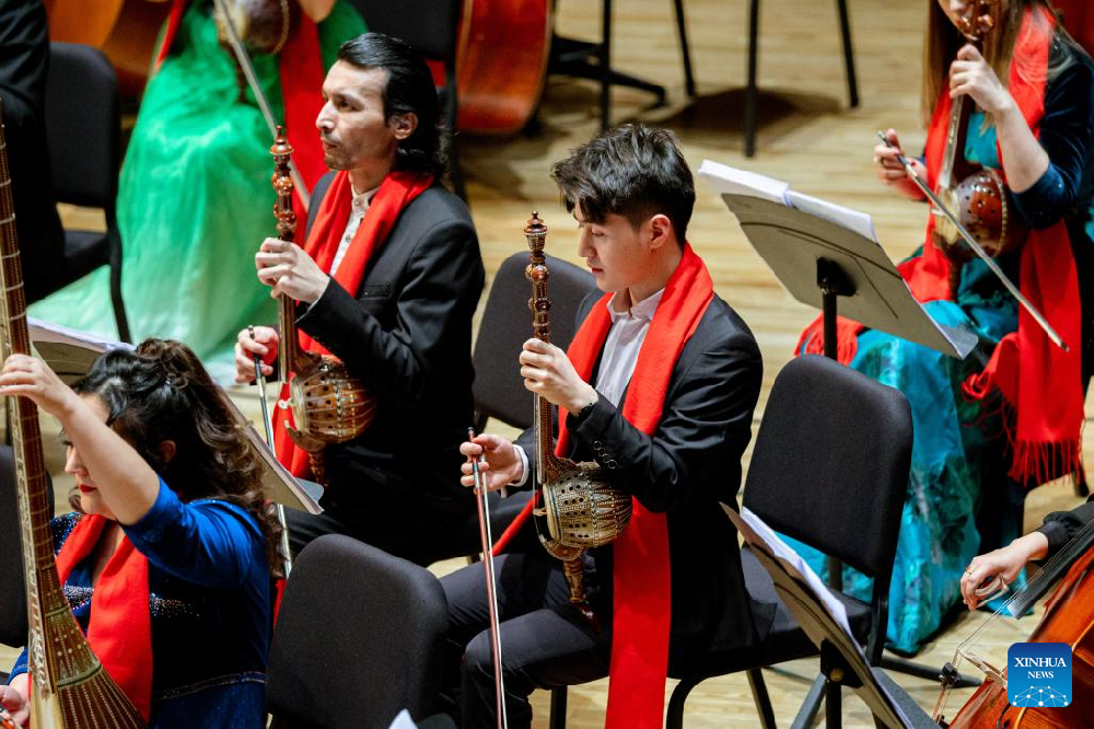 Across China: Xinjiang folk orchestra makes its name through musical fusion