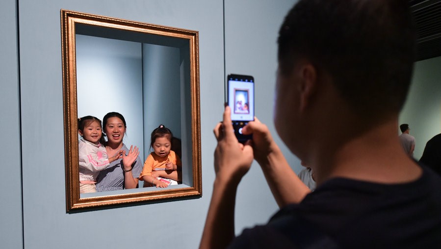 Exhibition shows portraits of mothers