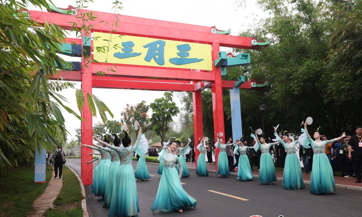 People celebrate the Double Third Festival with a dancing show in South China's Guangxi Zhuang Autonomous Region on April 11, 2024. Photo: Courtesy of Guangxi Daily