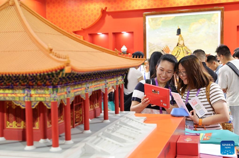 Visitors select creative cultural products at the booth of the Palace Museum during the 22nd China (Shenzhen) International Cultural Industries Fair in Shenzhen, south China's Guangdong Province, May 22, 2026.
The 22nd China (Shenzhen) International Cultural Industries Fair kicked off here on Thursday, showcasing over 120,000 cultural products. The Creative China exhibition area brings together domestic cultural IPs, sci-tech innovation products, cultural and tourism products, intangible cultural heritage products, and popular creative cultural products. Creative cultural products from more than 30 famous domestic cultural heritage institutions and museums are also showcased during the event, attracting numerous visitors. Photo: Xinhua