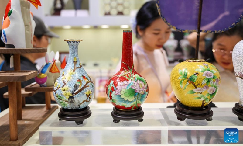 Visitors select creative cultural products at the 22nd China (Shenzhen) International Cultural Industries Fair in Shenzhen, south China's Guangdong Province, May 22, 2026.
The 22nd China (Shenzhen) International Cultural Industries Fair kicked off here on Thursday, showcasing over 120,000 cultural products. The Creative China exhibition area brings together domestic cultural IPs, sci-tech innovation products, cultural and tourism products, intangible cultural heritage products, and popular creative cultural products. Creative cultural products from more than 30 famous domestic cultural heritage institutions and museums are also showcased during the event, attracting numerous visitors. Photo: Xinhua