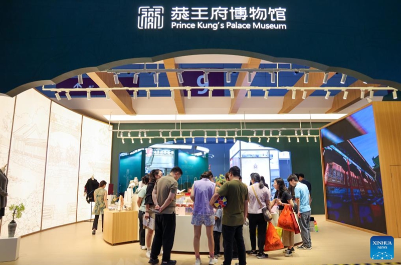 Visitors select creative cultural products at the booth of the Prince Kung's Palace Museum during the 22nd China (Shenzhen) International Cultural Industries Fair in Shenzhen, south China's Guangdong Province, May 22, 2026.
The 22nd China (Shenzhen) International Cultural Industries Fair kicked off here on Thursday, showcasing over 120,000 cultural products. The Creative China exhibition area brings together domestic cultural IPs, sci-tech innovation products, cultural and tourism products, intangible cultural heritage products, and popular creative cultural products. Creative cultural products from more than 30 famous domestic cultural heritage institutions and museums are also showcased during the event, attracting numerous visitors. Photo: Xinhua